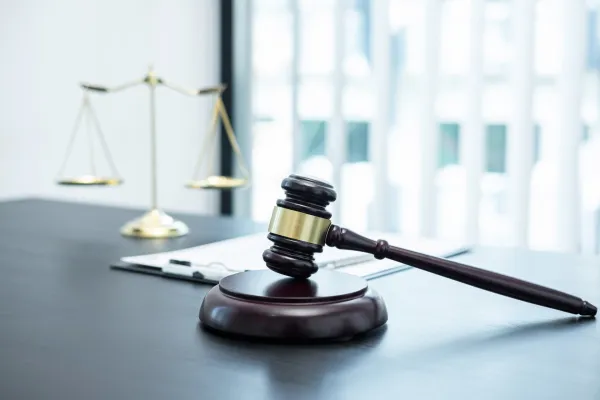 judge-gavel-with-justice-at-law-firm-in-background-2024-09-13-20-20-51-utc1-68ed032b8d069