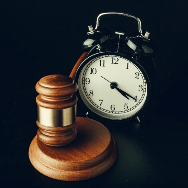 wooden-judge-hammer-with-alarm-clock-on-black-back-2025-02-25-21-39-12-utc-68ed1edf67227